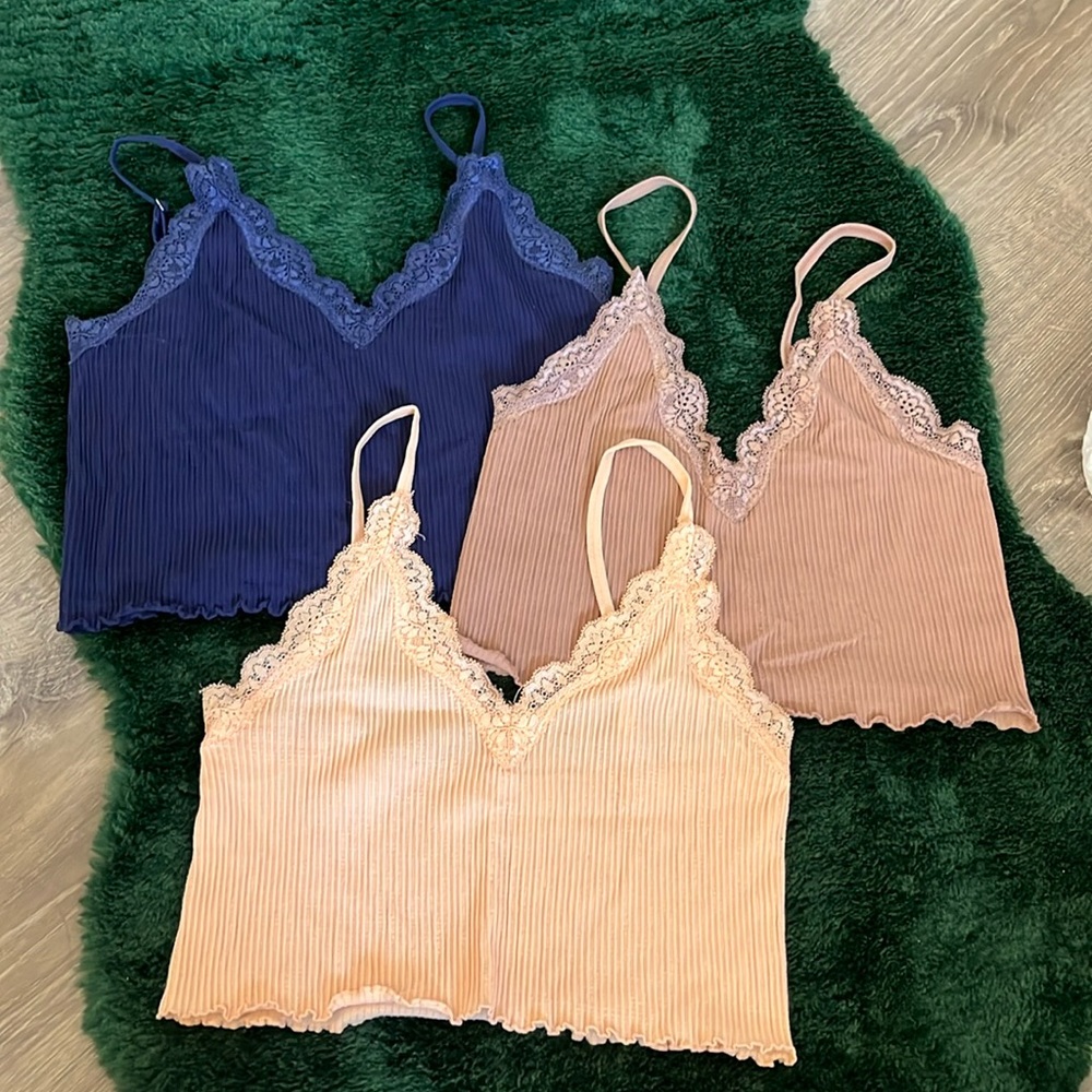 3 tank tops from forever 21! Navy blue, peachy orange, and a neutral color.